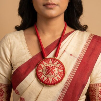 Japi Motif Pendant Necklace on Red Cord